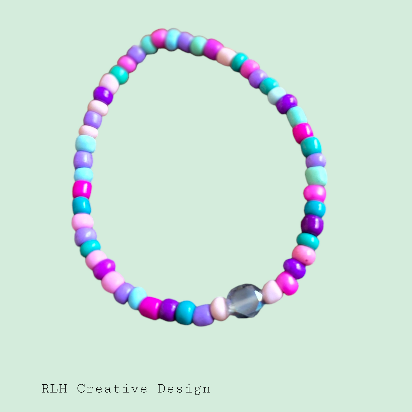 Pink, Purple, & Blue with Accent Bead by  RLH Creative Design