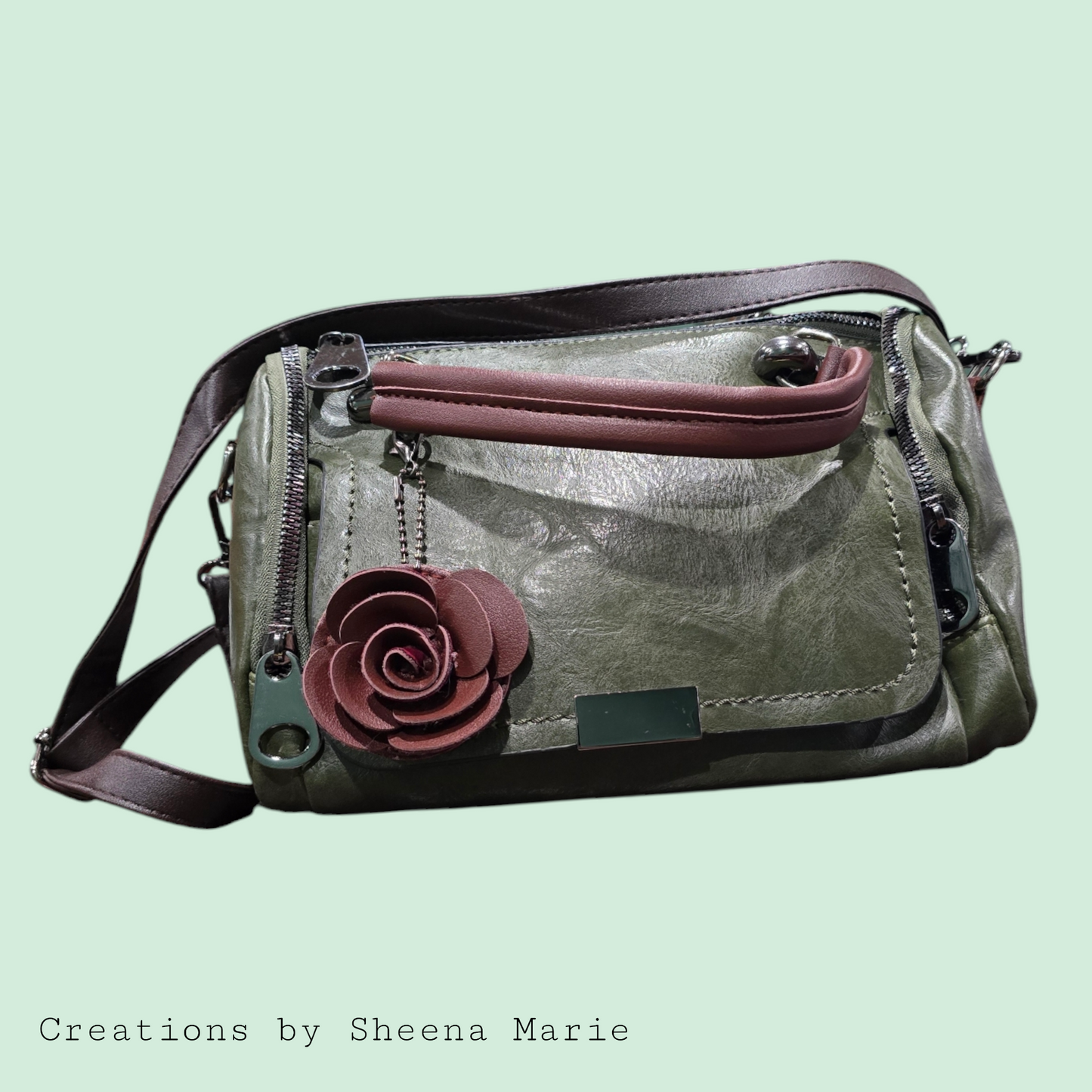 Faux Leather Barrel Crossbody Bag with Rosette Keychain