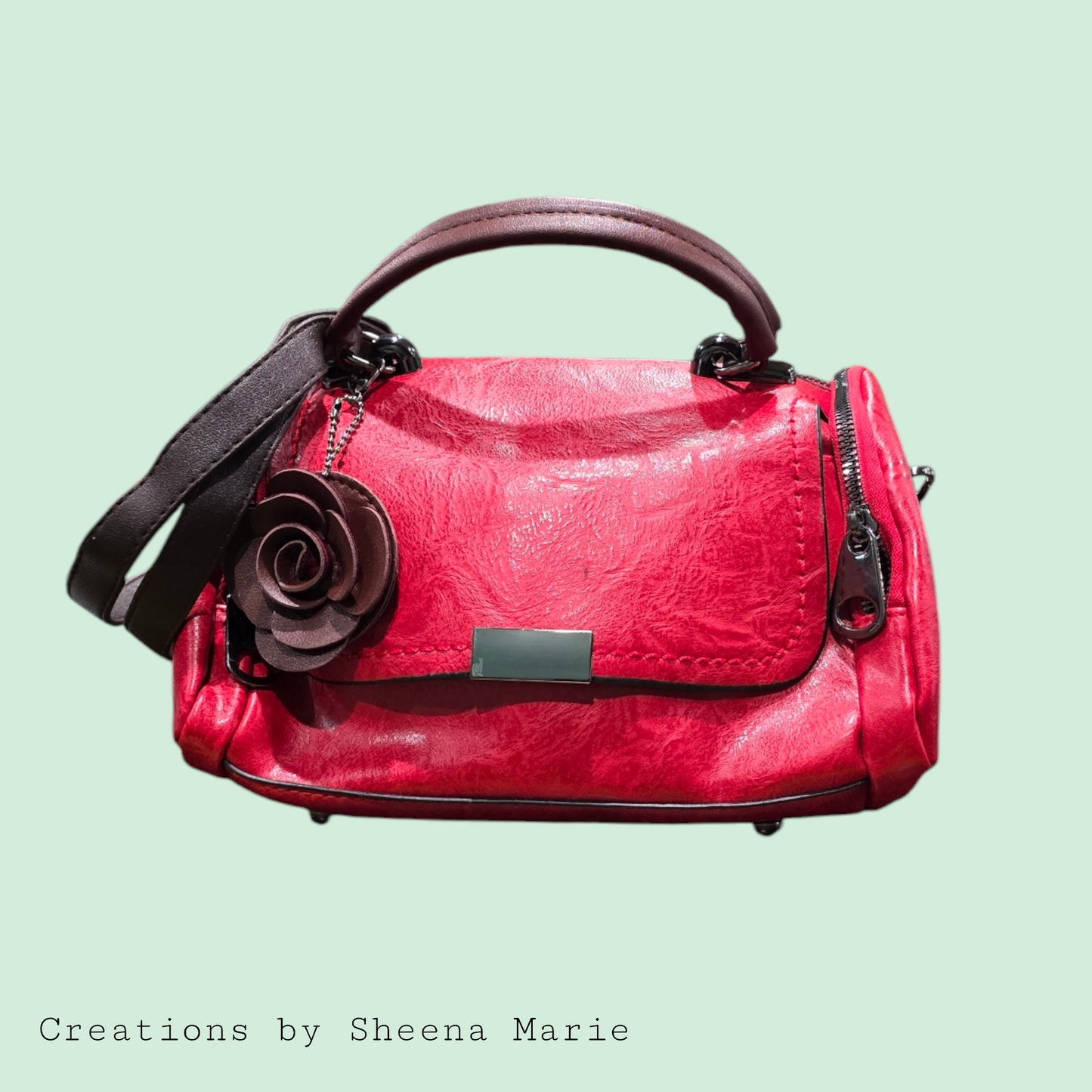 Faux Leather Barrel Crossbody Bag with Rosette Keychain