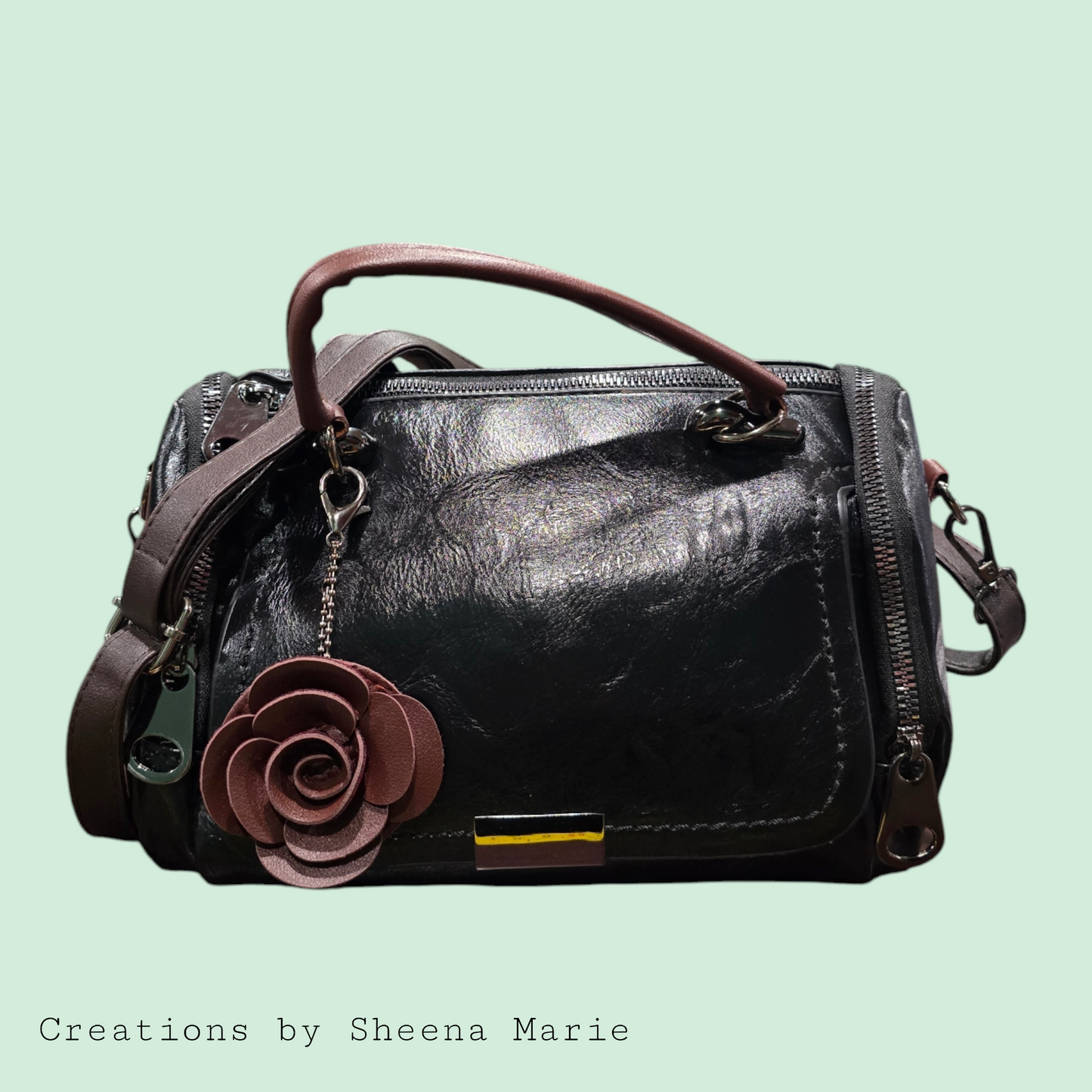 Faux Leather Barrel Crossbody Bag with Rosette Keychain