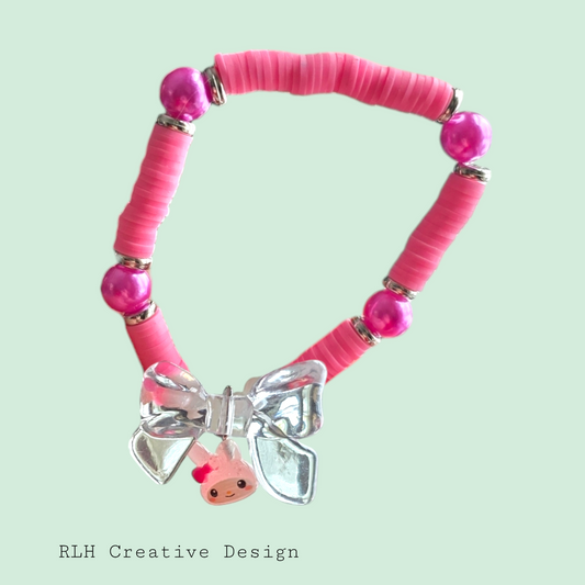 My Melody with Clear Bow Hand Beaded Stretch Bracelet by RLH Creative Design